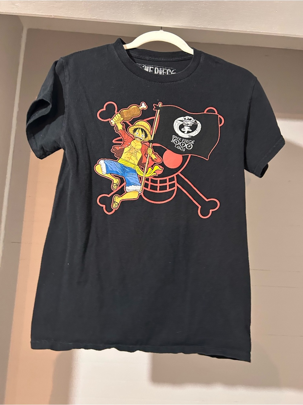 Ripple Junction Black Kids' One Piece Graphic Tee with Red & Yellow Print